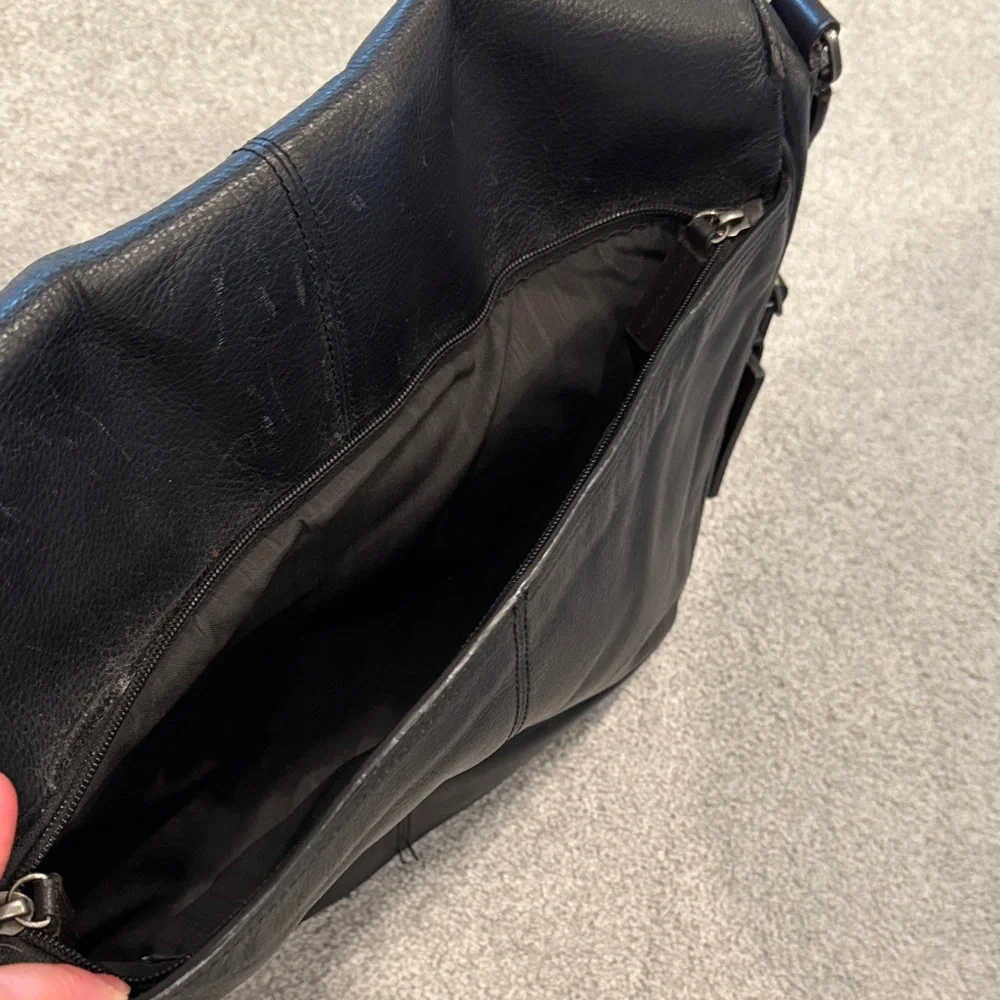 Tumi Black Leather Messenger Bag with Adjustable Strap